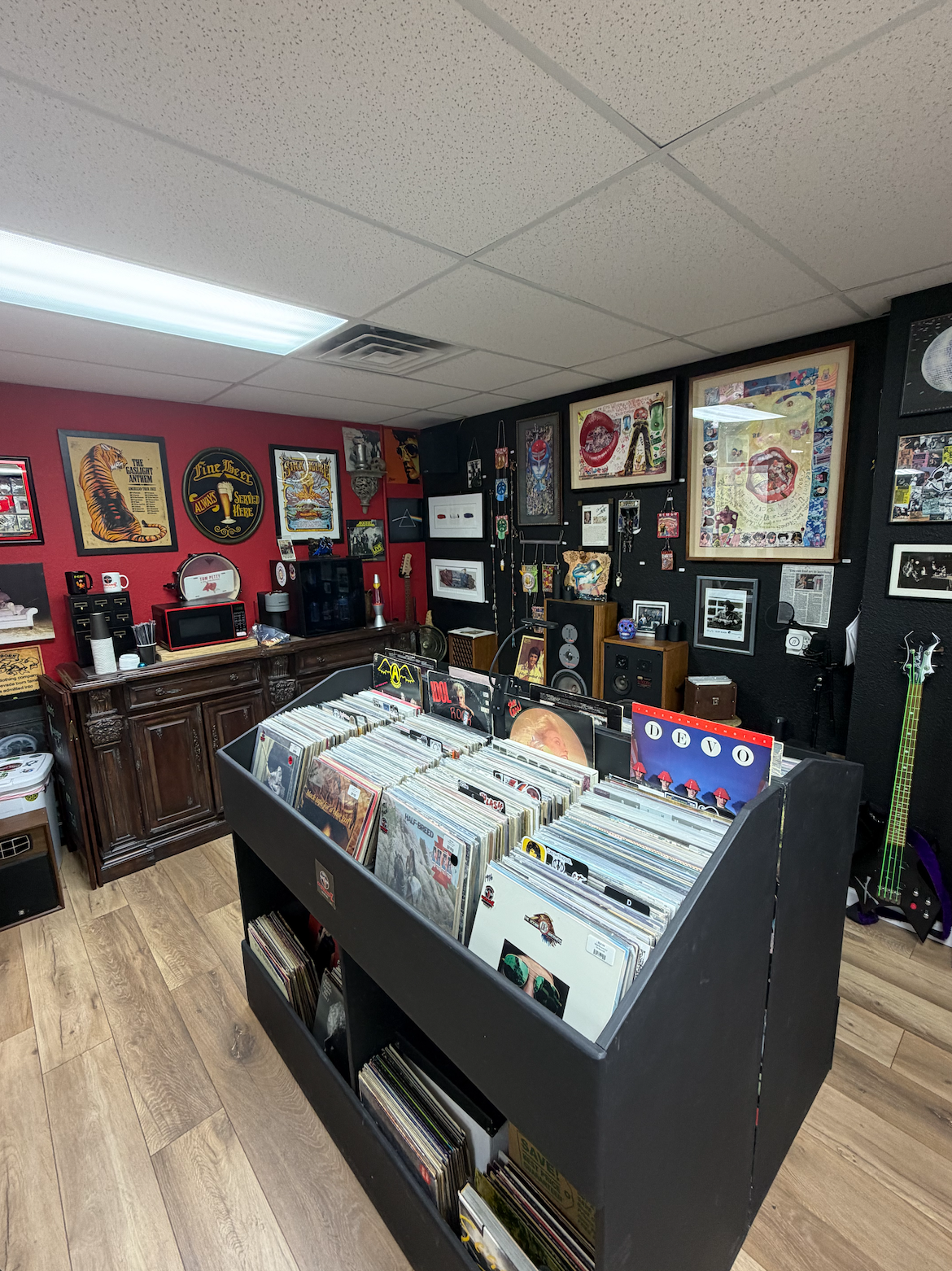 Hands flipping through vinyl records